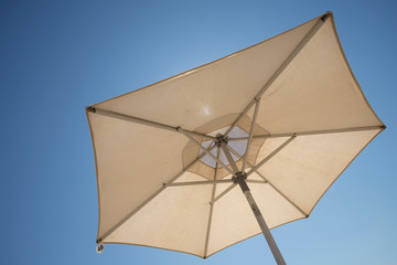 Beach umbrella in sunny weather