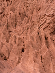 Iconic landmark, the rock formation Cerro De Los Siete Colores near the village Purmamarca in the canyon Quebrada de Humahuaca, listed as UNESCO World Heritage Site, Argentina.