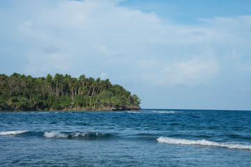 Melanesia, Papua New Guinea, Bismarck Sea, Tuam Island. Scenic Pacific Ocean coastal island view.