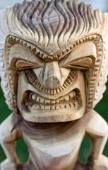 Polynesia, Kingdom of Tonga. Close-up of tiki carving.
