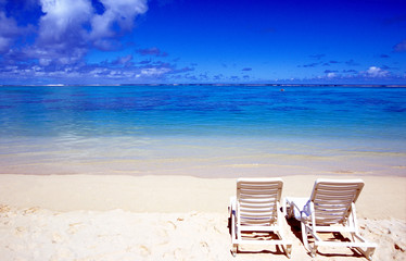 Beach chairs on beach Raratonga, Cook Islands