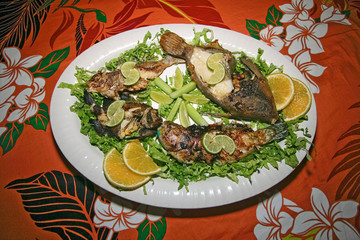 Kosrae, Micronesia. Freshly caught assorted tropical fish pan fried for dinner.