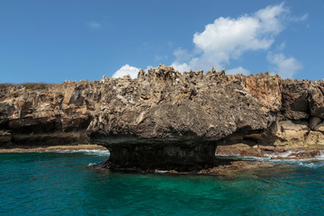 Brazil, Fernando de Noronha. Volcanic rock formations which are part of a submerged mountain range.