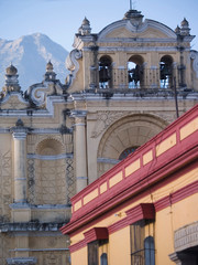 Antigua, Guatemala. Lamps in the colonial arched doorways near the town square at twilight.