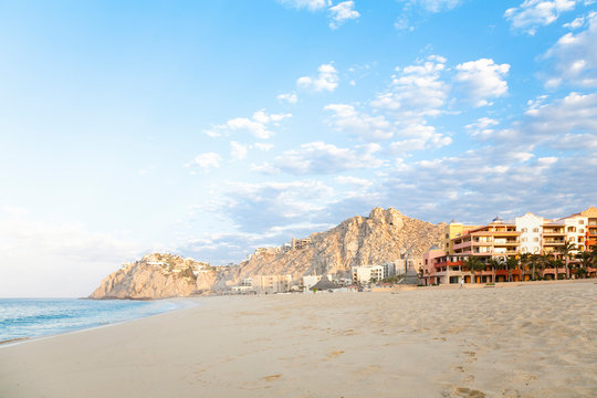 Cabo San Lucas, Baja California Sur, Mexico - An exterior view of a tropical resort on the beach.