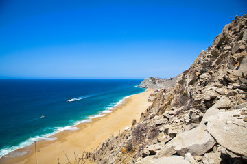 Cabo San Lucas, Baja California Sur, Mexico - A beach with a large rock formation.
