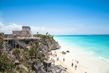 Cancun, Quintana Roo, Mexico - Ruins on a hill overlooking a tropical beach.