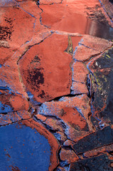 Mexico, San Miguel de Allende. Colorful patterns on wet cobblestone street. Credit as: Nancy Rotenberg / Jaynes Gallery / DanitaDelimont.com