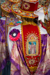 Peru, Calca, costumed dancer during Assumption of the Virgin festival in August.