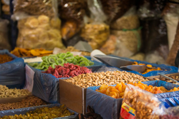 San Pedro Market, Cusco, Peru. Close-up view of fruits and nus at the market. - obrazy, fototapety, plakaty