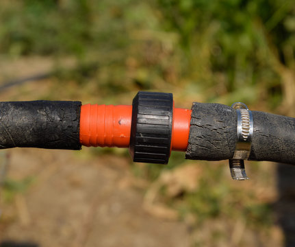 Hose connection for watering the garden. Watering hose and acces