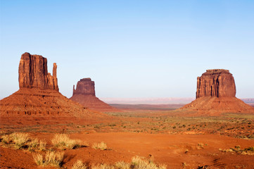 Fototapeta na wymiar USA, AZ, Navajo Reservation, Merrick Butte and the Mittens in Monument Valley Tribal Park at Sunset