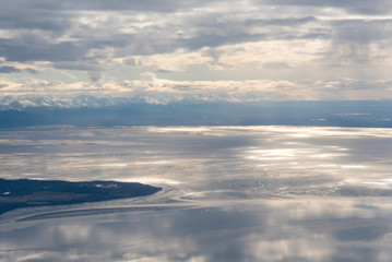 US, Alaska, Anchorage. Cook Inlet, Chugach Mountains dramatic light