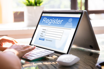 Businesswoman Filling Online Registration Form