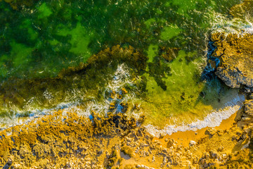 aerial view of rocks and beach