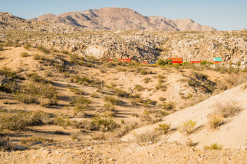 USA, Southern California, Drought Spotlight number 3, Rte 66 Expedition, view from Rockview Nature Park 2 miles north of Victorville, freight train headed south