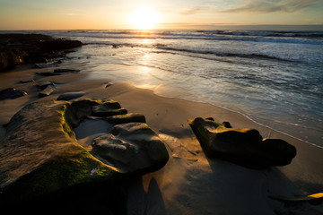 USA, California, La Jolla. Sunset on beach and rocks. Credit as: Christopher Talbot Frank / Jaynes...