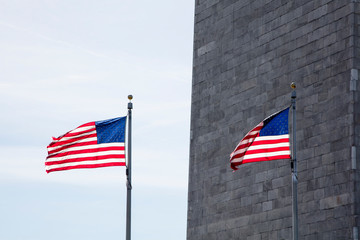 USA, Washington DC, Flags waving at the Washington Monument