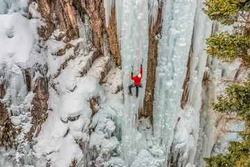 Fototapeten Ice climber ascending at Ouray Ice Park, Colorado © Howie Garber/Danita Delimont