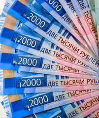 Obraz premium Russian money banknotes in nominal value of two thousand. New tickets of the bank of Russia. Russian money.