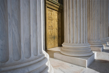 USA, Washington, D.C. View of the Supreme Court Building's columns and door. 