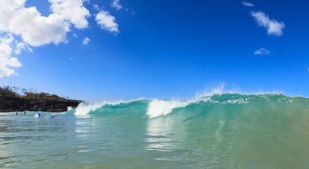 Fototapeta na wymiar Fisheye view of wave breaks at Hapuna Beach, Big Island, Hawaii