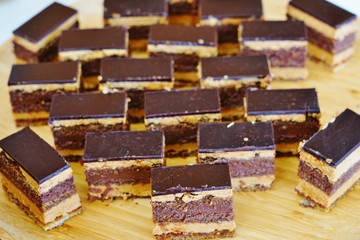 Slices of opera chocolate cake on a platter