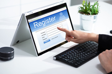 Businesswoman Filling Online Registration Form