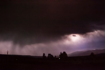 Naklejka na ściany i meble Rainstorm and Lightning over the Sawthooth Range, Sawtooth National Recreation Area, Idaho