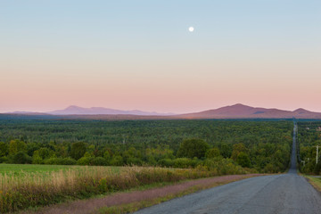 The moon over Mount Katahdin as seen from Townline Road (part of the International Appalachian Trail) in Merrill, Maine (near Smyrna Mills.)