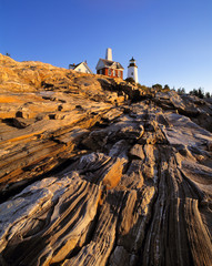 USA, Maine, Pemaquid Light. The striated, carved rocks near the Pemaquid Lighthouse in Maine, are a...