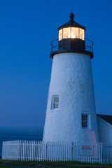Maine, Pemaquid. Light from the historical lighthouse offers protection to ships at sea along the...