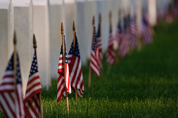 American flags on tombs of American Veterans on Memorial Day, Zachary Taylor National Cemetery,...