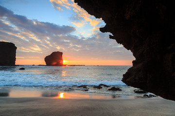 View from beach at Manele Bay of Puu Pehe (Sweetheart Rock) at sunrise, South Shore of Lanai...