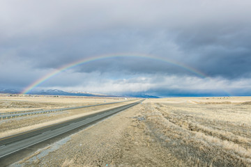 USA, Montana, near Missoula, Rainbow over I-90