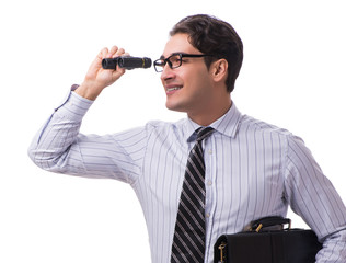 Young handsome businessman looking into future with binoculars