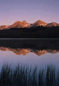 USA, Idaho, Sawtooth Range. Little Redfish Lake reflections at sunrise. 