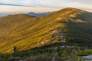 The Appalachian Trail on Saddleback Mountain in Maine's High Peaks Region. The summit of The Horn is in the background.