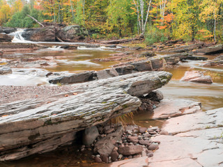 USA, Michigan, Upper Peninsula. Bonanza Falls, where the Iron river glides over smooth slanted rocks.