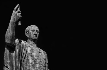 Caesar Augustus Nerva Emperor of Ancient Rome bronze statue in Imperial Forum (Black and White with copy space)