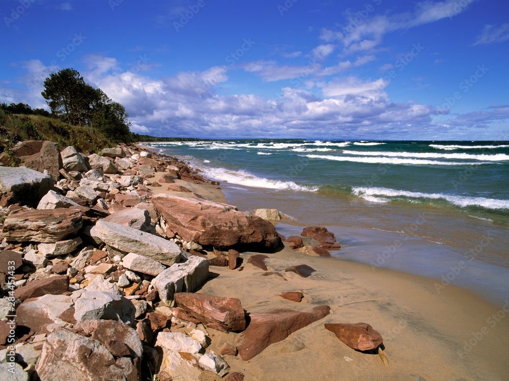 Sticker USA, Michigan, Pictured Rocks NL. Waves rush the smooth, sandy shoreline of Lake Superior at Pictured Rocks National Lakeshore, Michigan.