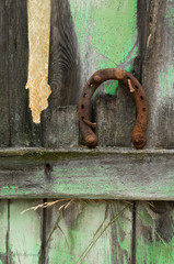 USA, Montana. Rusty horseshoe on old fence of a homestead. Credit as: Nancy Rotenberg / Jaynes Gallery / DanitaDelimont.com