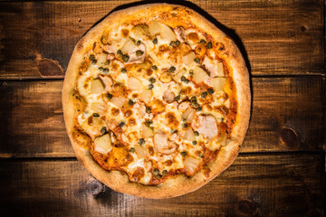 Fresh pizza made in a small bakery