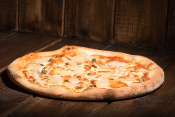 Fresh pizza made in a small bakery