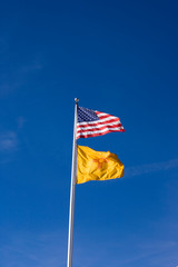 NA, USA, New Mexico, Santa Fe, New Mexican and US Flag 