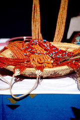 Obraz premium USA, New Mexico, Santa Fe. Annual Santa Fe Indian Market, Indian made coral & turquoise necklaces.
