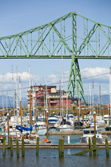View of marina and historic Astoria Bridge on the Columbia River. Astoria, Oregon