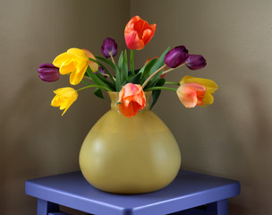 USA, Oregon, Portland. Fresh-cut tulips in antique glass vase. 
