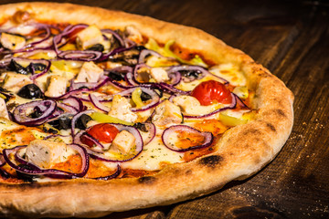 Fresh pizza made in a small bakery
