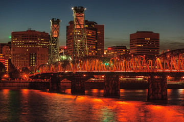 Hawthorne Bridge and city skyline. Willamette River, Portland, Oregon.